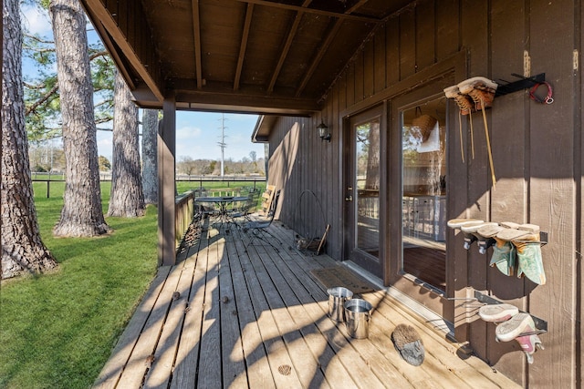 wooden deck with a yard