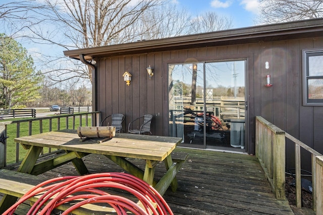 deck with outdoor dining space