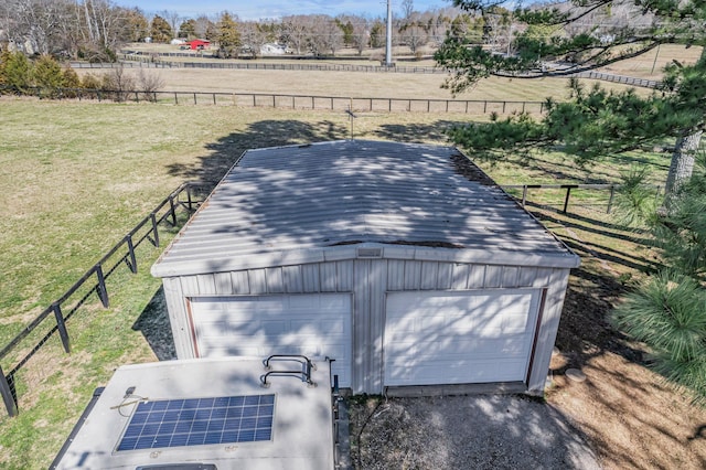 exterior space with an outdoor structure and fence