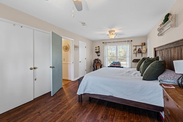 bedroom with a ceiling fan and wood finished floors