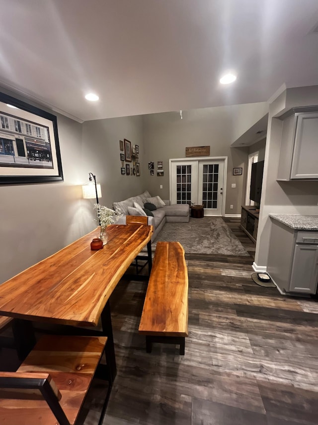 dining room featuring baseboards, dark wood-style flooring, and recessed lighting