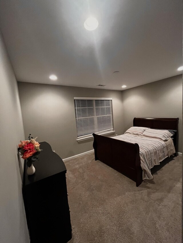 bedroom featuring baseboards, carpet flooring, and recessed lighting