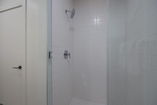 full bathroom with a shower stall