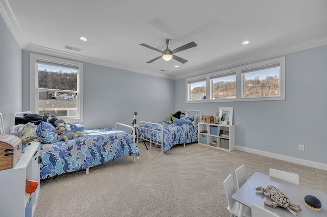 bedroom featuring multiple windows, visible vents, and ornamental molding