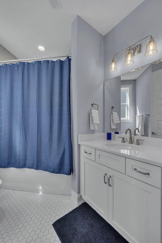 full bath featuring tile patterned flooring, toilet, visible vents, vanity, and a shower with curtain