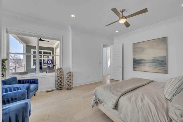 bedroom with visible vents, baseboards, ornamental molding, light wood-style floors, and recessed lighting