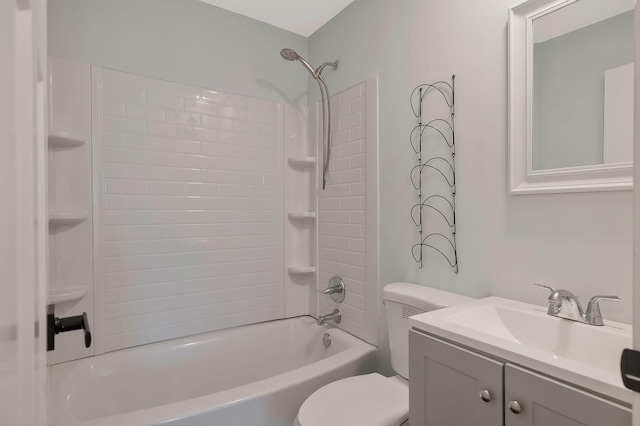 full bath featuring shower / bathing tub combination, vanity, and toilet