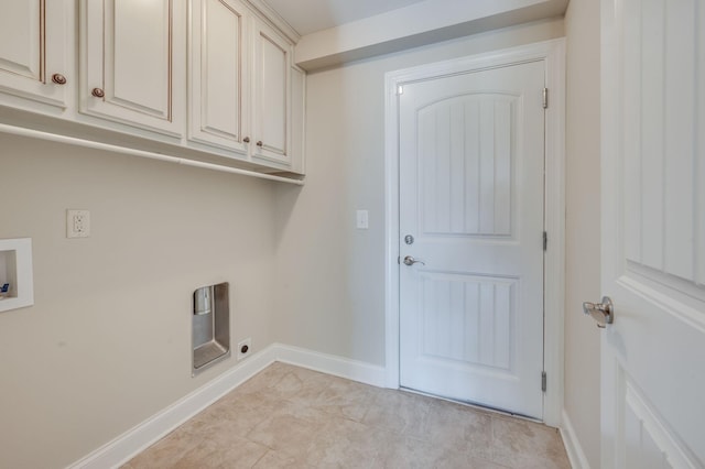 laundry area with cabinet space, hookup for a washing machine, baseboards, and electric dryer hookup