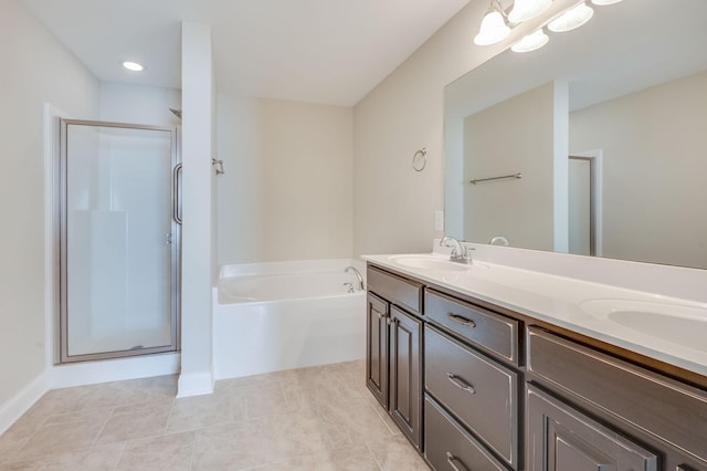 full bath with a garden tub, double vanity, a sink, and a shower stall