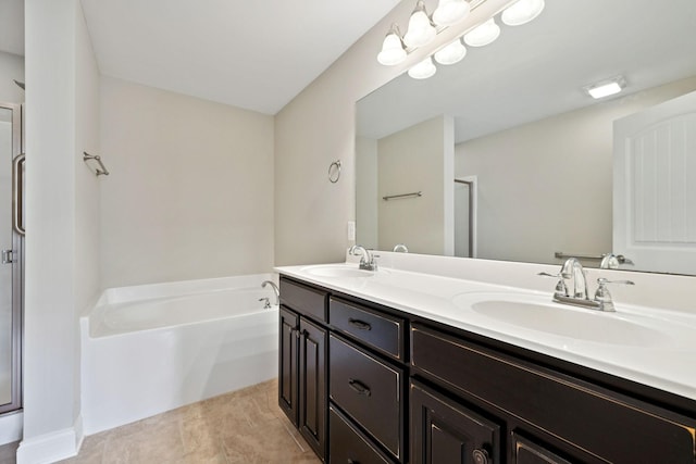 1012 Irish Way, Spring Hill, TN 37174 - bathroom with double vanity, a garden tub, an enclosed shower, and tile patterned flooring