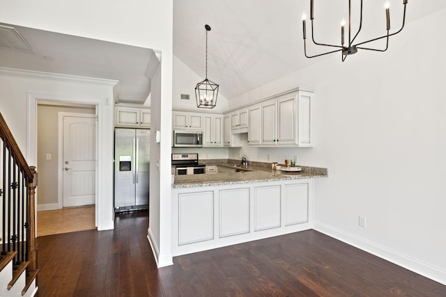 1012 Irish Way, Spring Hill, TN 37174 - kitchen with appliances with stainless steel finishes, a chandelier, a sink, baseboards, and dark wood-type flooring