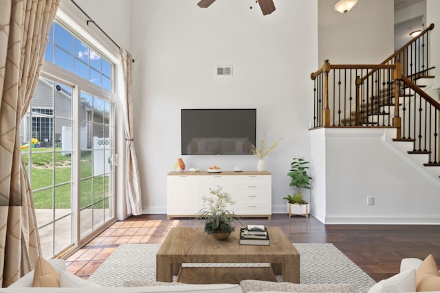 1012 Irish Way, Spring Hill, TN 37174 - living area with a high ceiling, stairs, a ceiling fan, baseboards, and wood finished floors