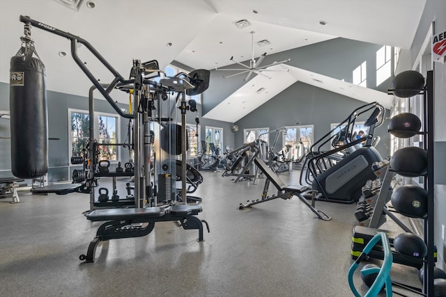 workout area with high vaulted ceiling and visible vents