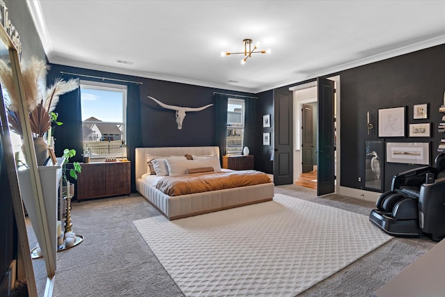 bedroom with carpet, visible vents, crown molding, and an inviting chandelier