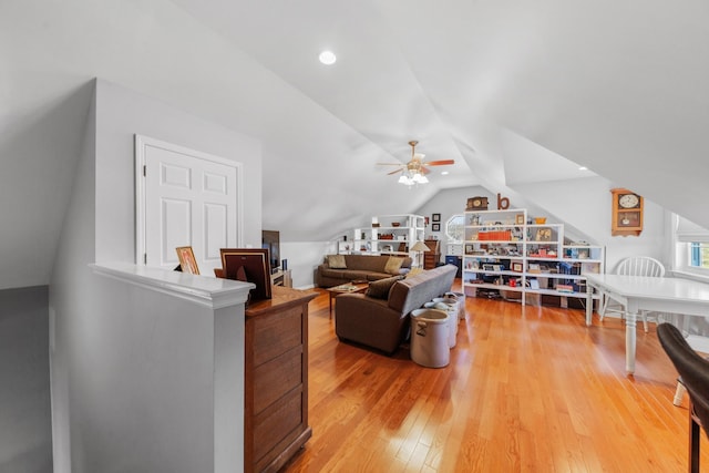 interior space with light wood-style floors, ceiling fan, vaulted ceiling, and recessed lighting