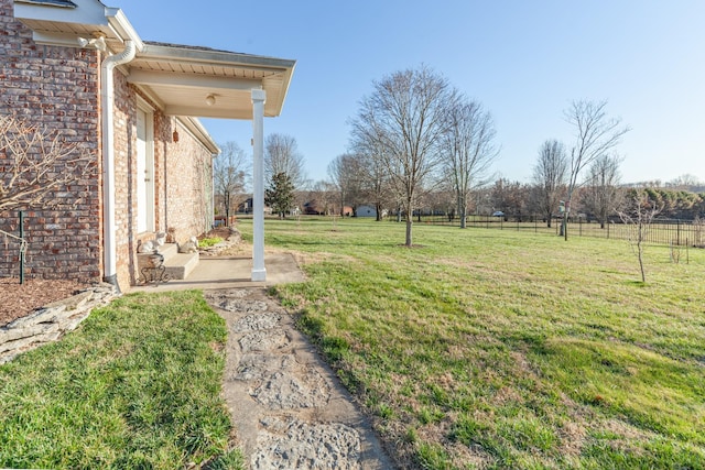 view of yard featuring fence