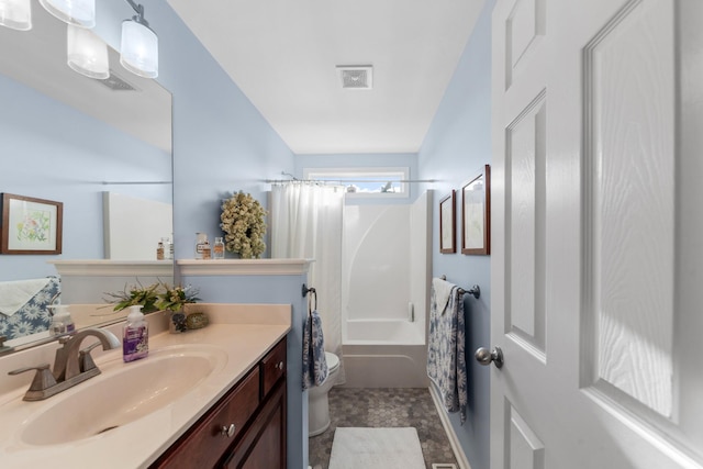 bathroom featuring toilet, shower / tub combo, vanity, and visible vents