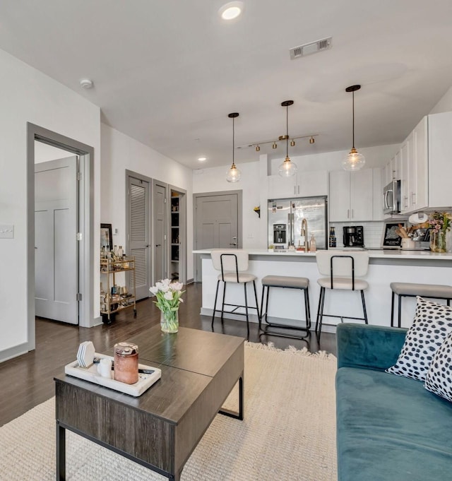 1638 54th Ave N Unit 210, Nashville, TN 37209 - living room featuring recessed lighting, visible vents, and dark wood finished floors