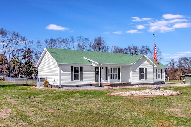 view of front of house featuring crawl space, covered porch, fence, and a front lawn