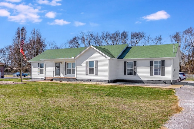 single story home featuring crawl space and a front lawn