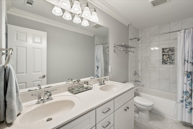 full bathroom featuring crown molding, visible vents, and a sink