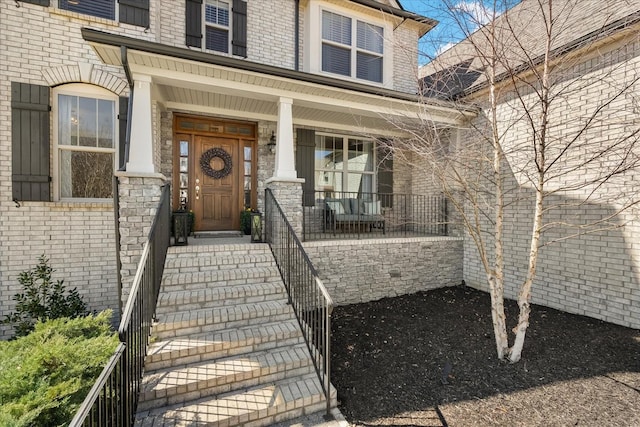 doorway to property with covered porch