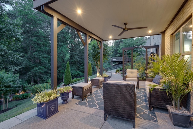 view of patio featuring outdoor lounge area and a ceiling fan