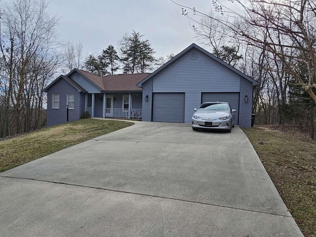 single story home with an attached garage, covered porch, brick siding, concrete driveway, and a front lawn