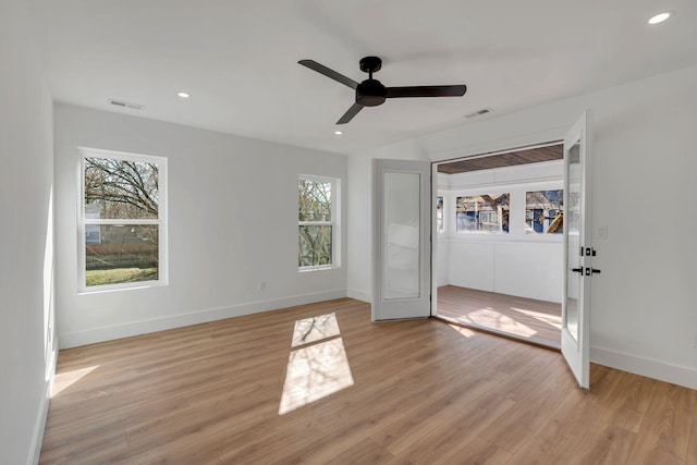 unfurnished bedroom featuring light wood-type flooring, visible vents, and recessed lighting