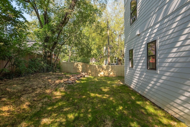 view of yard featuring fence