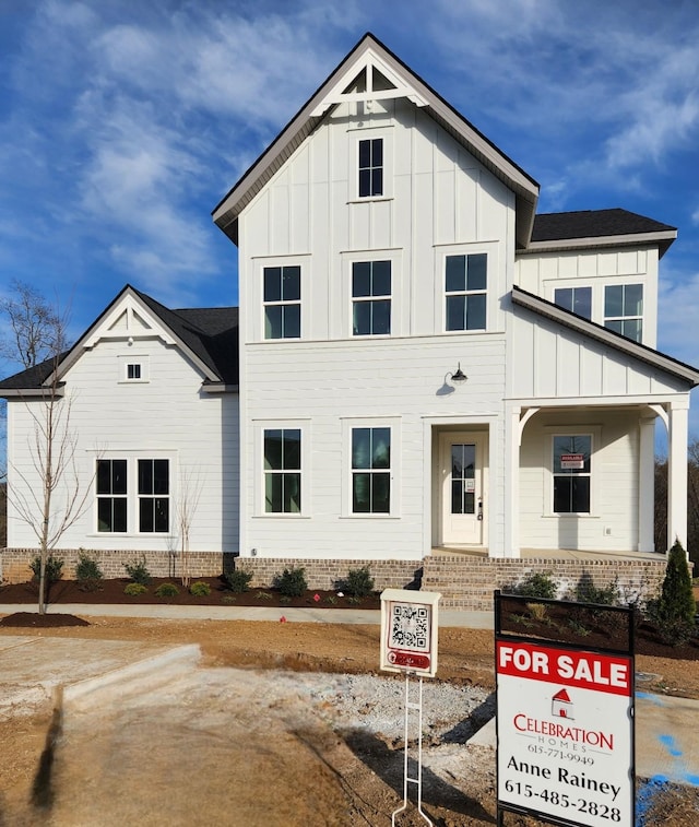 modern inspired farmhouse with board and batten siding