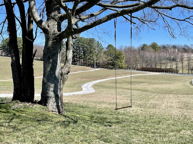 view of home's community featuring a lawn