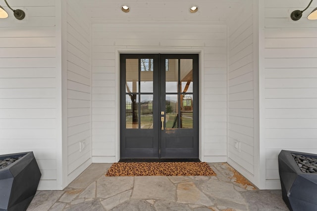 entrance to property featuring french doors