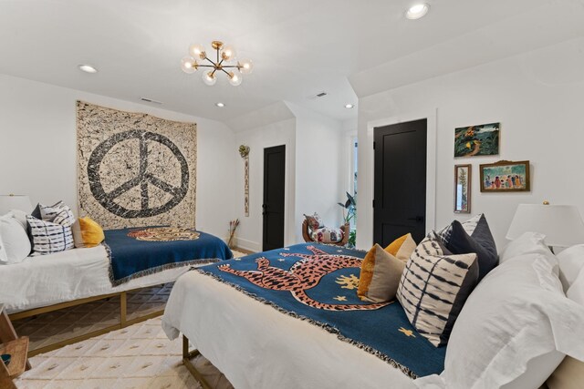 bedroom featuring recessed lighting, visible vents, and an inviting chandelier