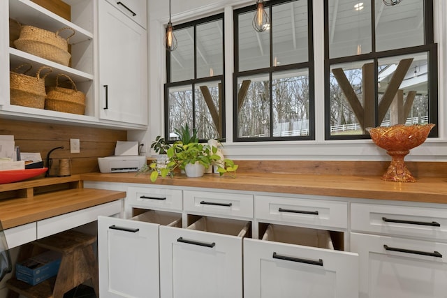 interior space featuring hanging light fixtures