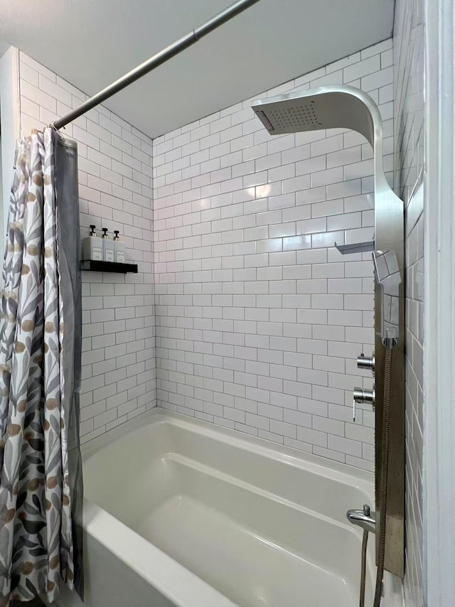 full bathroom featuring shower / bath combination with curtain