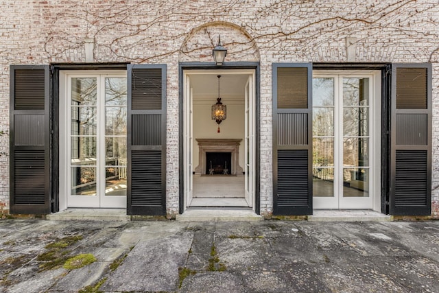 entrance to property featuring french doors