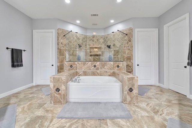 bathroom with baseboards, visible vents, walk in shower, a bath, and recessed lighting