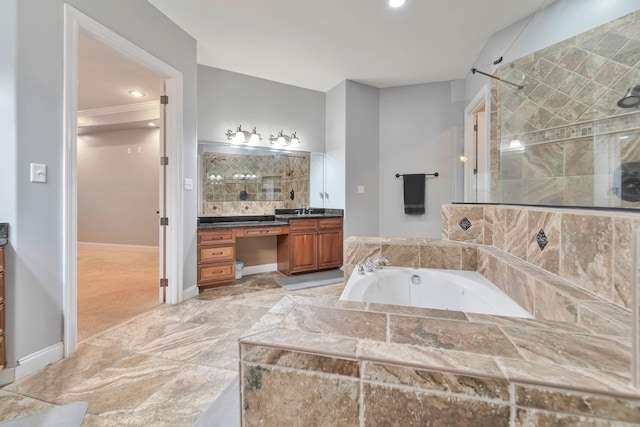 bathroom with a tile shower, vanity, and a bath