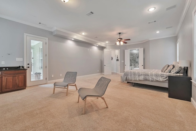 bedroom featuring baseboards, ornamental molding, visible vents, and light colored carpet