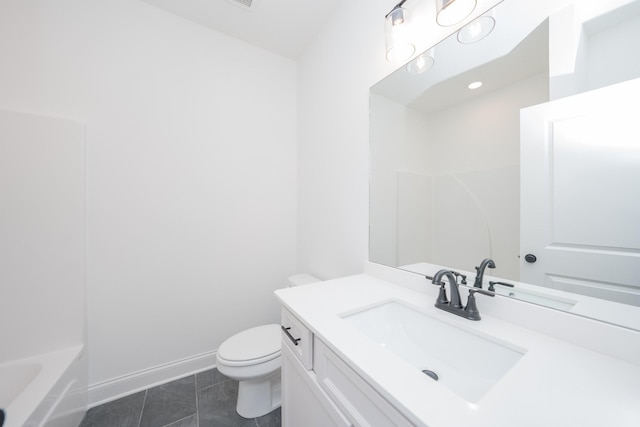 full bathroom featuring baseboards, toilet, tile patterned floors, a bathtub, and vanity