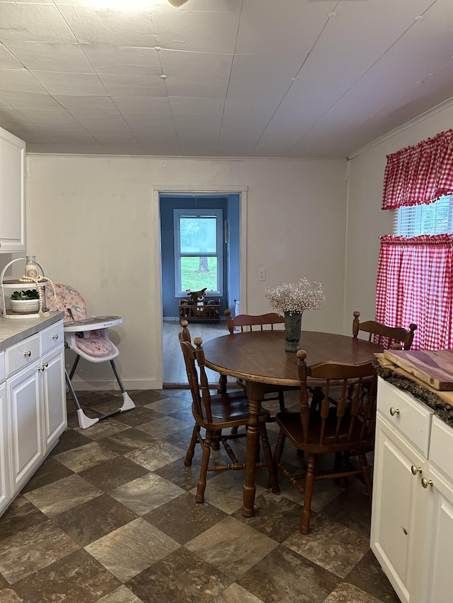 dining space with baseboards