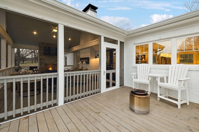 wooden terrace with a sunroom