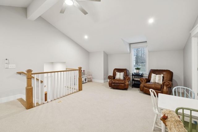 living area with lofted ceiling with beams, a ceiling fan, an upstairs landing, baseboards, and carpet