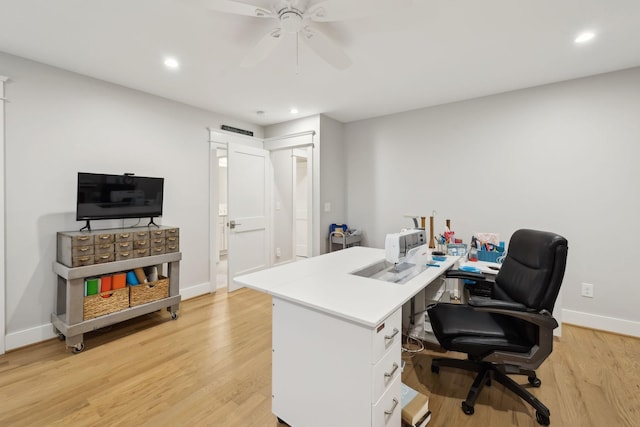 office featuring light wood-style flooring and baseboards