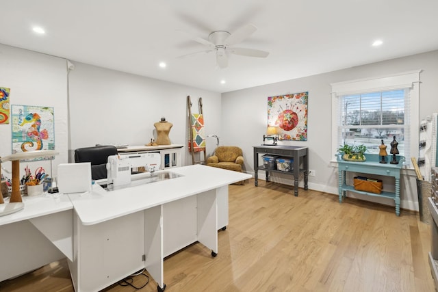 home office featuring light wood-style floors, ceiling fan, baseboards, and recessed lighting