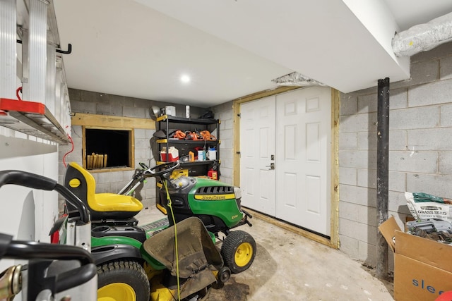 interior space featuring concrete block wall