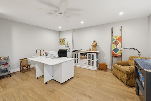 office area featuring light wood-type flooring, baseboards, and recessed lighting