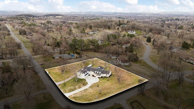 drone / aerial view featuring a mountain view