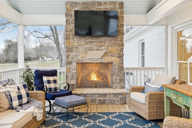 interior space featuring an outdoor stone fireplace